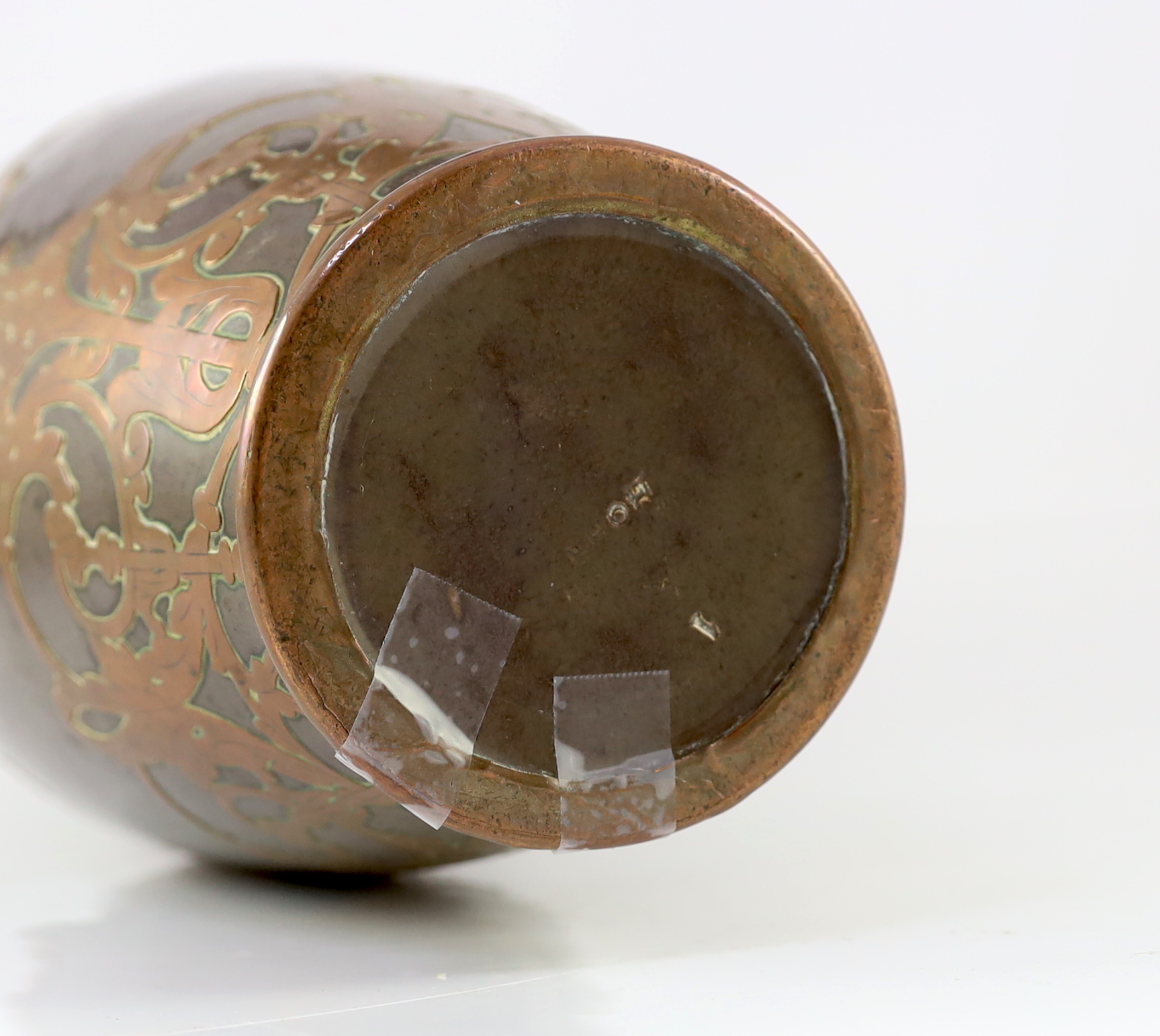 Attributed to Peter Behrens (German, 1868-1940). An Art Nouveau pottery and copper overlaid vase by Marzi & Remy, Hohr
